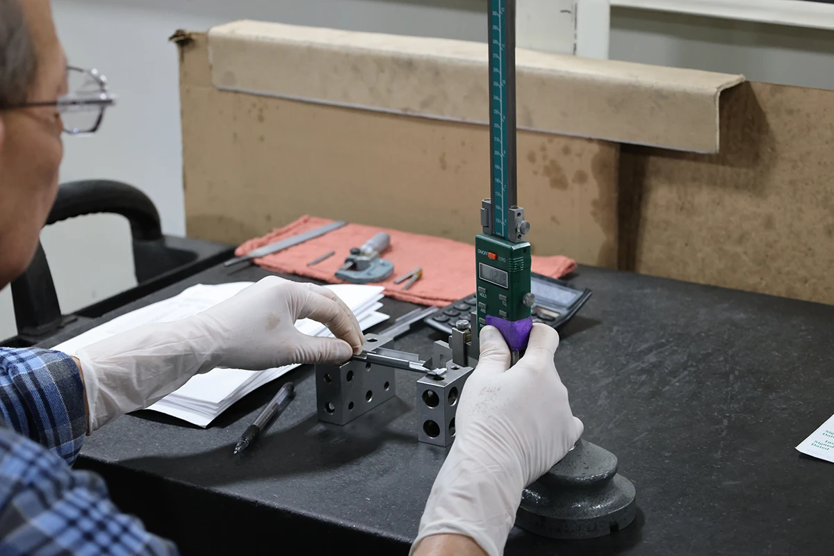 Quality height gauge inspection of machined medical component